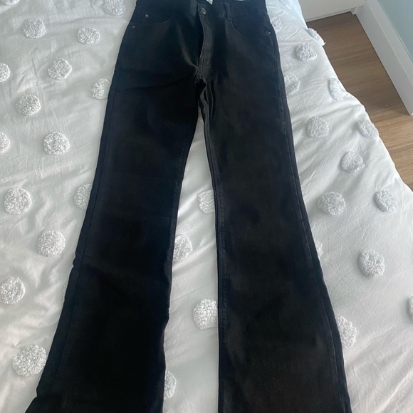 Never worn. Black flared jeans. - Picture 1 of 3